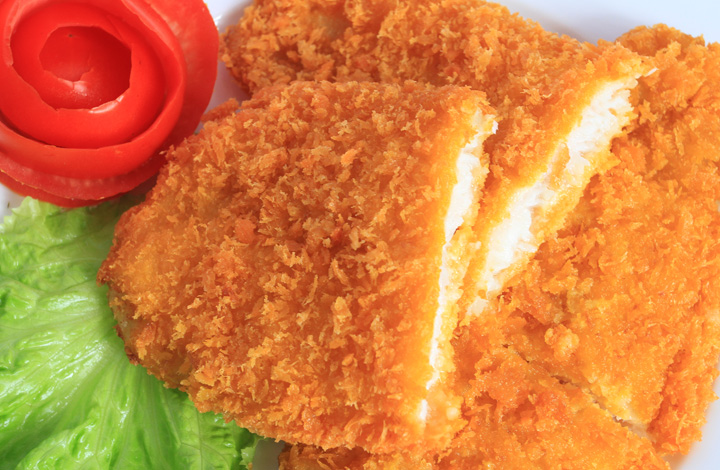 Crispy breaded pangasius portions